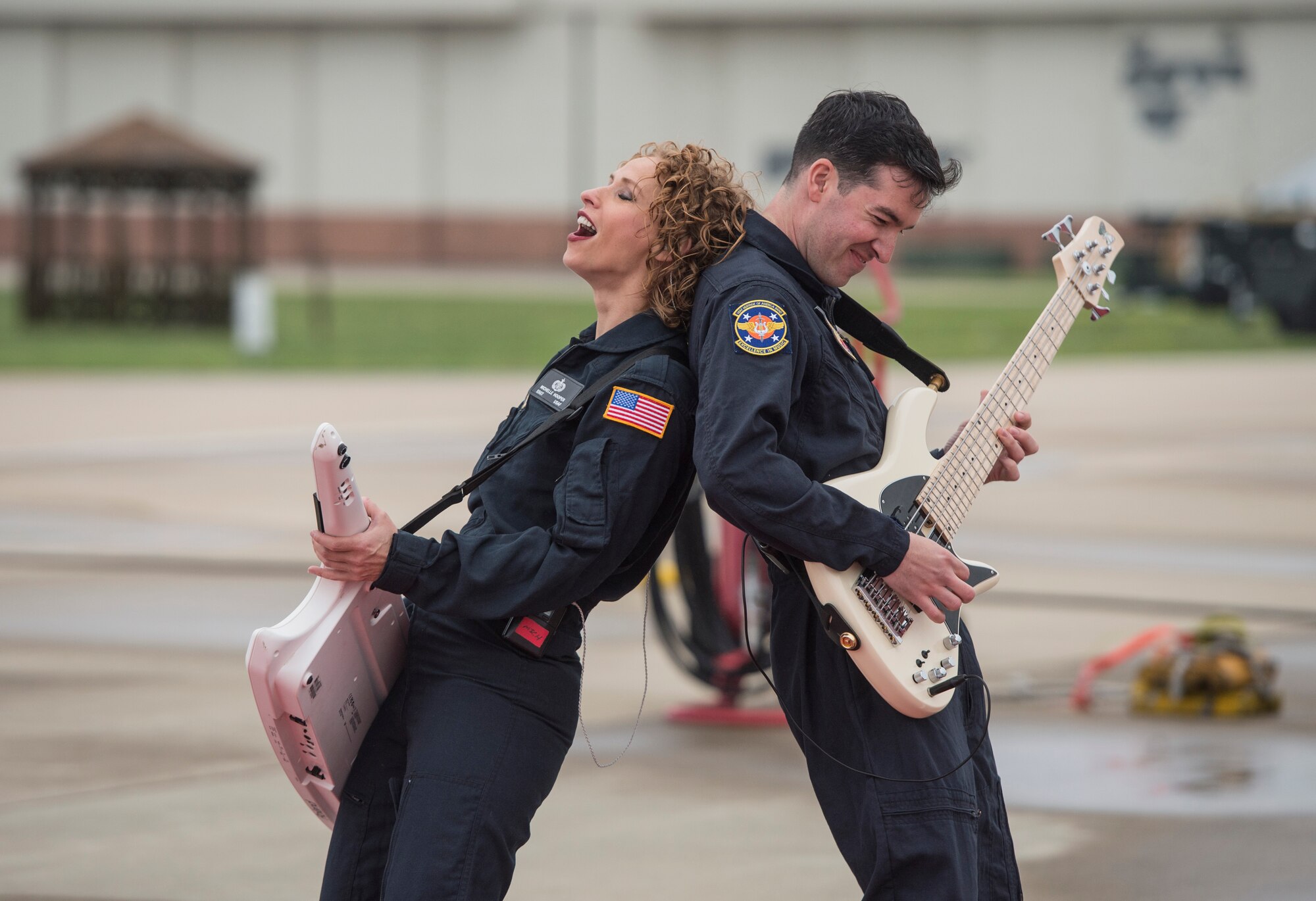 Full Spectrum pianist U.S. Air Force Tech. Sgt. Michelle Hooper and bassist Staff Sgt. Jordan Kimble perform in front of U.S. Airmen at Langley Air Force Base, Va., May 4, 2016. Full Spectrum is a six-piece band from the U.S. Air Force Heritage of America Band. (U.S. Air Force photo by Senior Airman Kayla Newman)