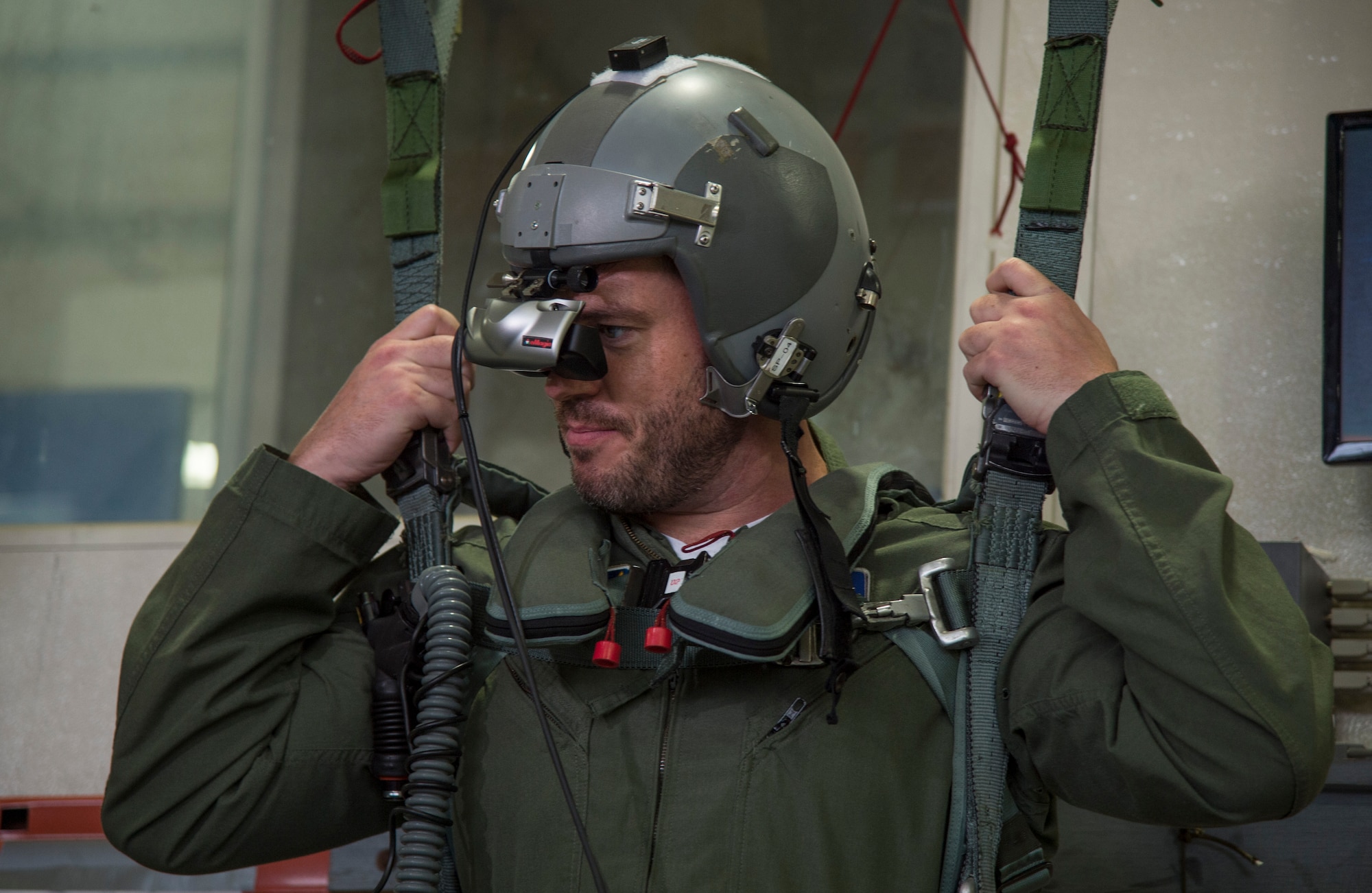 Jesse Palmer, correspondent for ABC’s Good Morning America, receives hanging harness training at Langley Air Force Base, Va., May 3, 2016. The simulator put Palmer in a situation where he has ejected from an aircraft and must navigate his parachute and land safely. (U.S. Air Force photo by Senior Airman Kayla Newman)