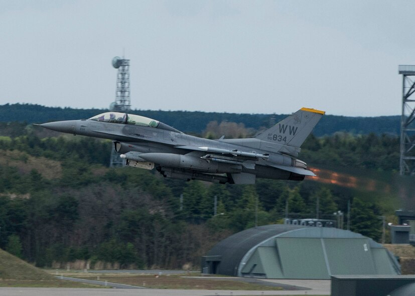 An F-16D Fighting Falcon takes off at Misawa Air Base, Japan, May 4, 2016. The F-16s at Misawa uphold the 35th Fighter Wing’s mission, which is Suppression of Enemy Air Defenses. Pilots aim to destroy surface-to-air missile sites by detecting them through radar and using self-sacrificing maneuvers to draw them away from allied aircraft. The F-16D differs from the F-16B model in that is a two-seat aircraft used for training missions and incentive flights. (U.S. Air Force photo by Airman 1st Class Jordyn Fetter)