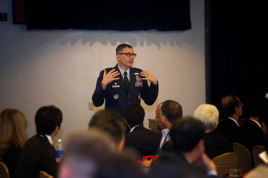 Lt. Col David Mccleese, 374th Civil Engineer Squadron commander, speaks before Industry Day participants at Yokota Air Base, Japan, April 28, 2016. The conference was a chance for participants to learn about the projects that are underway at the various military institutions. (U.S. Air Force photo by Senior Airman Delano Scott/Released)