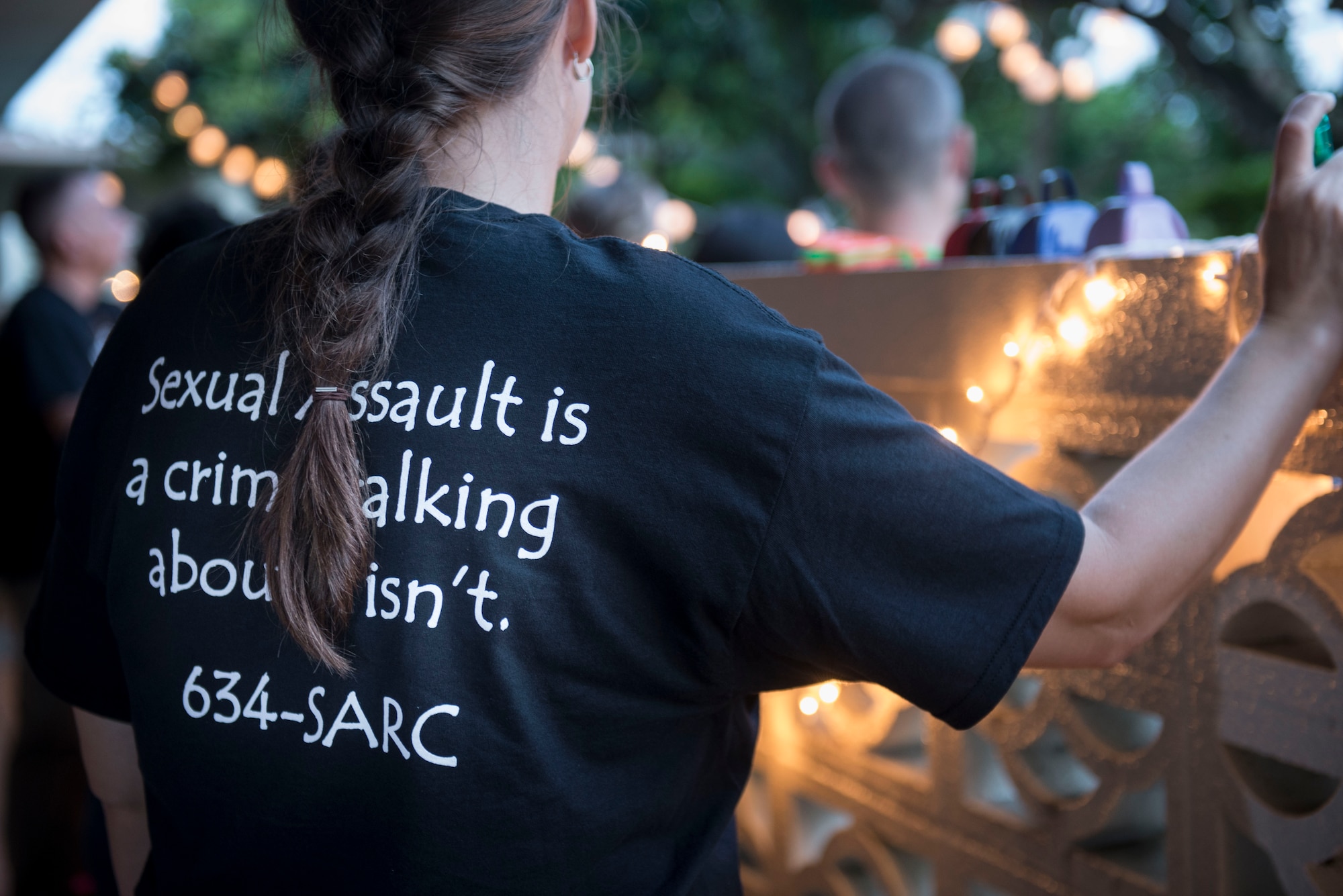 Women, men and children united together and marched against sexual assault during the Take Back the Night march April 29, 2016, at Kadena Air Base, Japan. The Take Back the Night event is held annually on Kadena Air Base to raise awareness around the installation about sexual assault. (U.S. Air Force photo by Senior Airman Omari Bernard)