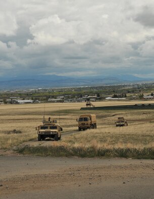 Airmen from the 120th Mission Support Group, Montana Air National Guard, perform convoy training during a field training exercise April 30, 2016, at Fort Harrison in Helena, Mont. The Airmen were able to meet readiness requirements and sharpen contingency skills in a simulated combat environment during the training. (U.S. Air National Guard photo by Tech. Sgt. Christy Mason)