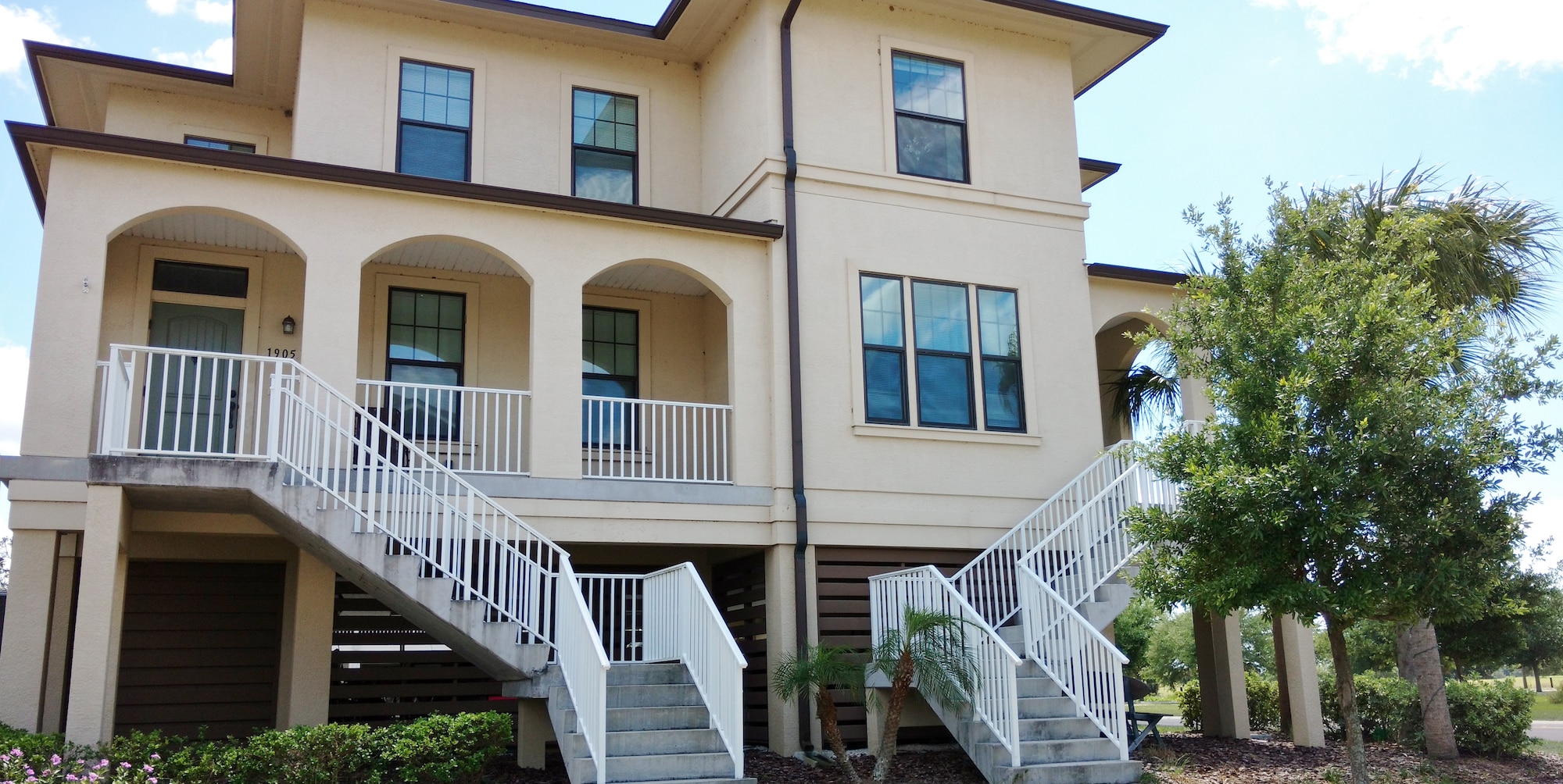 An example of the new homes constructed at MacDill Air Force Base, Florida, after Clark Realty took over ownership, and Harbor Bay the management, in 2007. Constructed in 2011, the duplex in the Freedom Cove neighborhood houses junior non-commissioned officers. The 2,100-square-foot homes include four bedrooms, two-and-a-half bathrooms, a screened in porch, laminate floors and Energy Star-rated appliances.  (Photo courtesy of Nick Leabo/Harbor Bay)