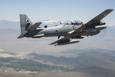 An A-29 Super Tucano flies over Kabul, Afghanistan, April 28, 2016. The highest priority skillset for the Afghan Air Force A-29 pilots is the effective execution of close air support (CAS). Pilots are trained to employ rockets, precision-guided bombs, general purpose bombs, and strafe. It will employ a variety of weapons to do this mission: .50 cal machine guns, 2.75 inch rockets, 250 and 500 pound general purpose and guided bombs. (U.S. Air Force photo by Staff Sgt. Larry Reid, Jr.,released)