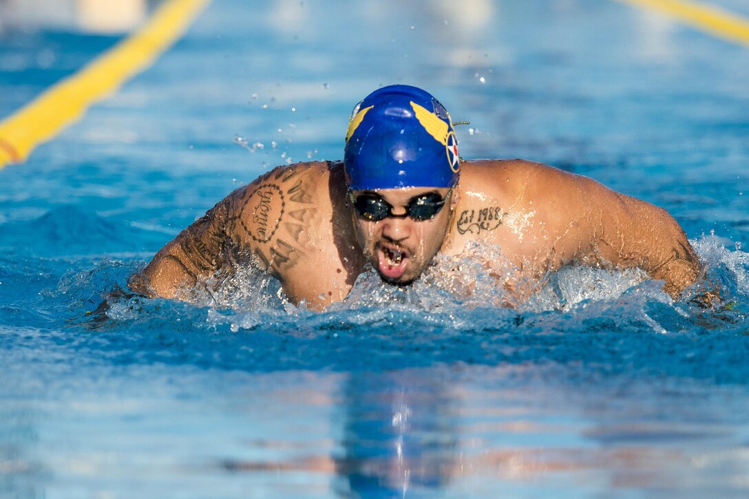 Team USA athlete Christian Perryman warms up for practice swimming heats at the 2016 Invictus Games in Orlando, Fla., May 5, 2016. The United States is among 15 countries competing in the 2016 Invictus Games. Air Force photo by Senior Master Sgt. Kevin Wallace