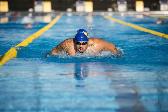Christian Perryman, an Airman and Team U.S.A. athlete, warms up before 2016 Invictus Games practice swimming heats at the ESPN Wide World of Sports complex at Walt Disney World in Orlando, Fla., May 5, 2016. Fifteen countries are competing in the 2016 Invictus Games and there are 108 medals to be earned in the swimming competitions. (U.S. Air Force photo/Senior Master Sgt. Kevin Wallace)