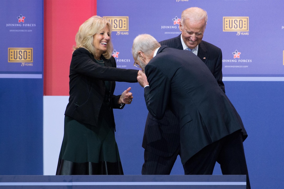 Dr. Jill Biden and Vice President Joe Biden react to former Late Show host David Letterman kissing Dr. Biden’s hand during a comedy show celebrating the 75th anniversary of the USO and the 5th anniversary of the Joining Forces initiative at Joint Base Andrews near Washington, D.C,. May 5, 2016. DoD photo by E.J. Hersom