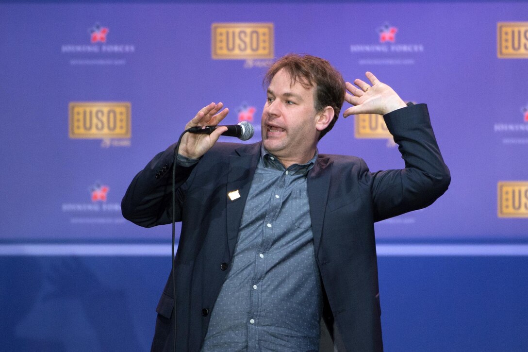 Comedian Mike Birbiglia performs during the comedy show celebrating the 75th anniversary of the USO and the 5th anniversary of the Joining Forces initiative at Joint Base Andrews near Washington, D.C,. May 5, 2016. DoD photo by E.J. Hersom