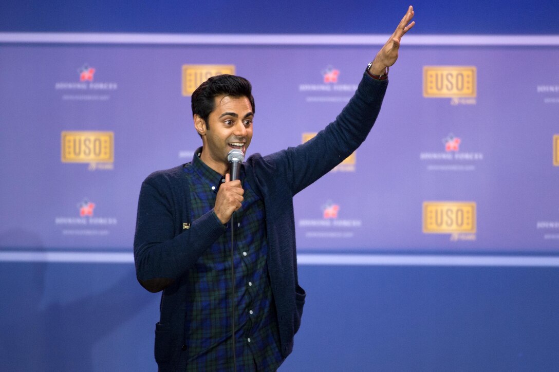 Comedian Hasan Minhaj performs during the comedy show celebrating the 75th anniversary of the USO and the 5th anniversary of the Joining Forces initiative at Joint Base Andrews near Washington, D.C,. May 5, 2016. DoD photo by E.J. Hersom