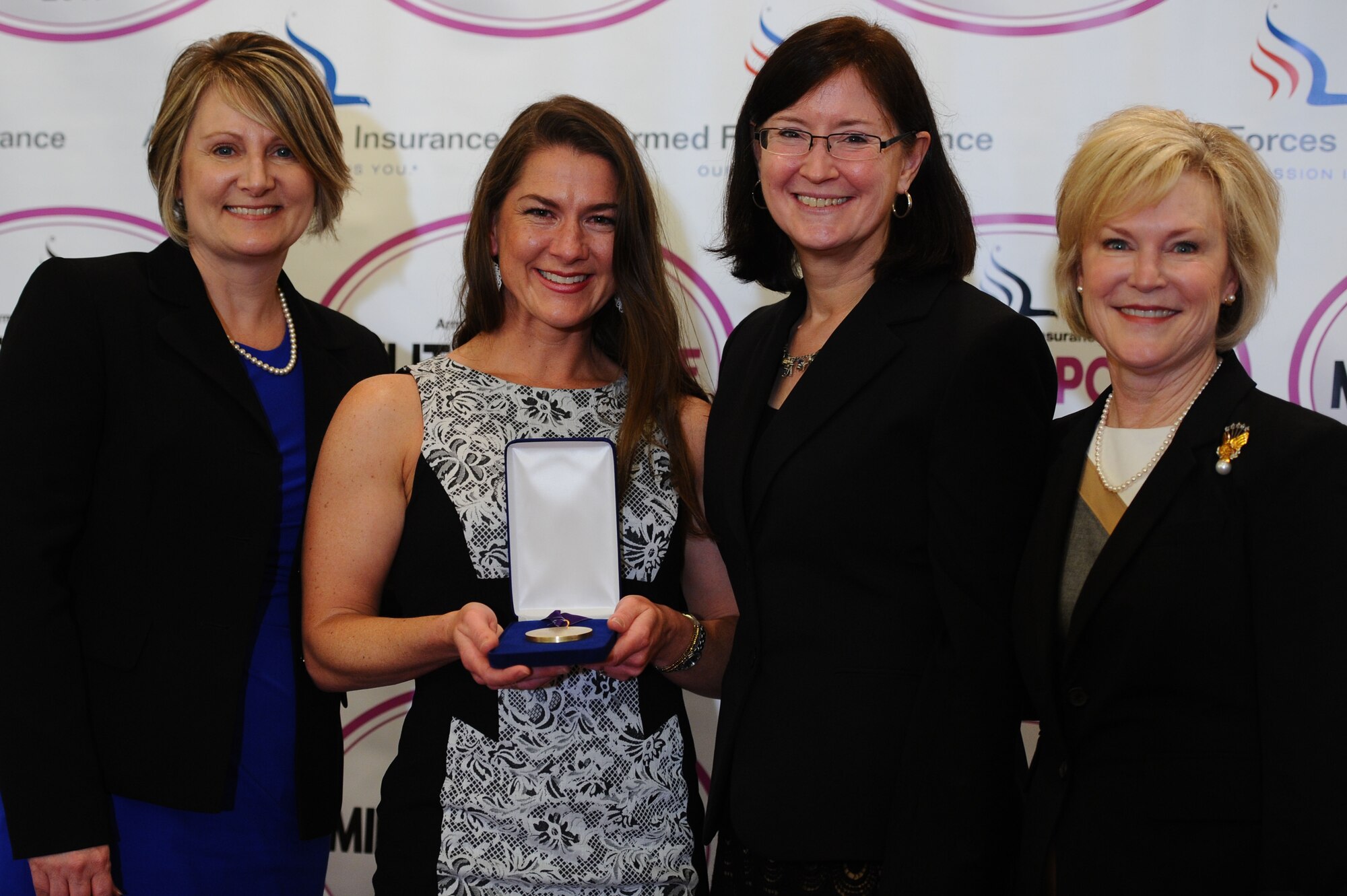 Military spouses Marie Hotaling, Michelle Aikman, Ricki Selva and Dawn Goldfein attended the Military Spouse of the Year award luncheon May 5, 2016, at Fort Myer in Arlington, Va. More than 100 military spouses attended the event. (U.S. Air Force photo/Tech. Sgt. Bryan Franks)