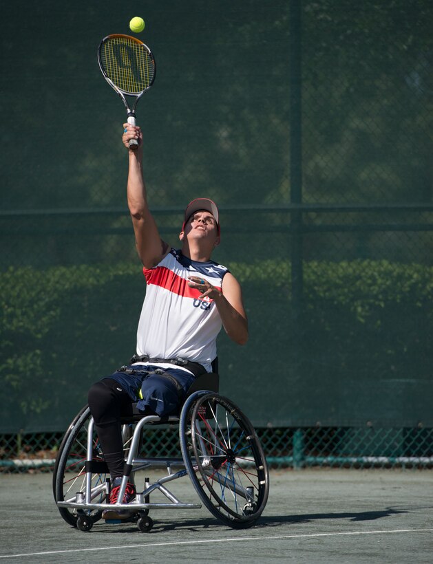 Retired Navy Javier Rodriguez trains for the wheelchair tennis event at the 2016 Invictus Games in Orlando, Fla., May 5, 2016. DoD photo by Roger Wollenberg