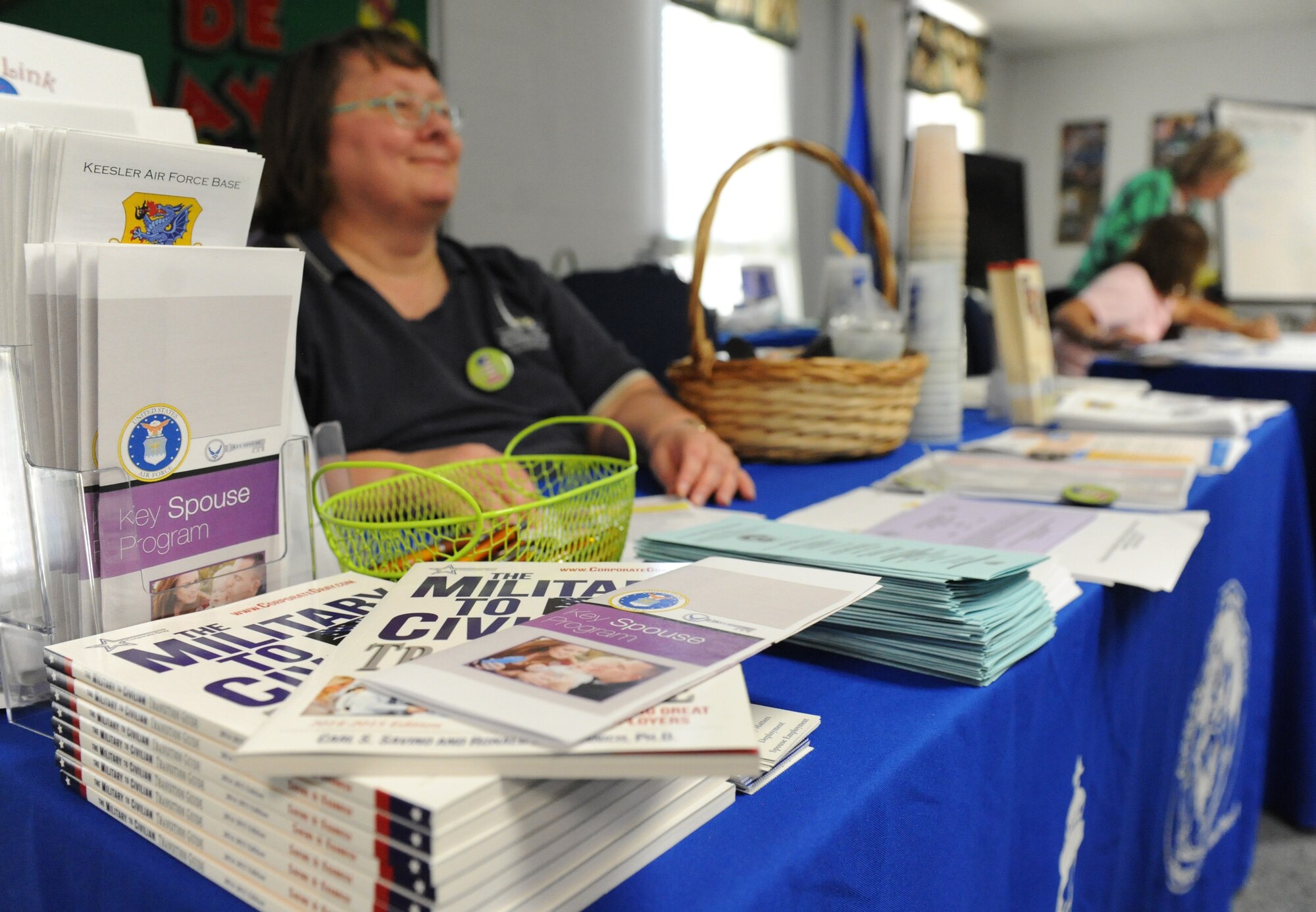 Lana Smith, 81st Force Support Squadron community readiness consultant, shares information about Keesler’s Airmen and Family Readiness Center programs during Pamper Me Day at the Sablich Center May 5, 2016, Keesler Air Force Base, Miss. Keesler’s Airman & Family Readiness Center has hosted the event for the past 12 years, offering spouses free manicures, hair styling tips and information and business booths. (U.S. Air Force photo by Kemberly Groue)