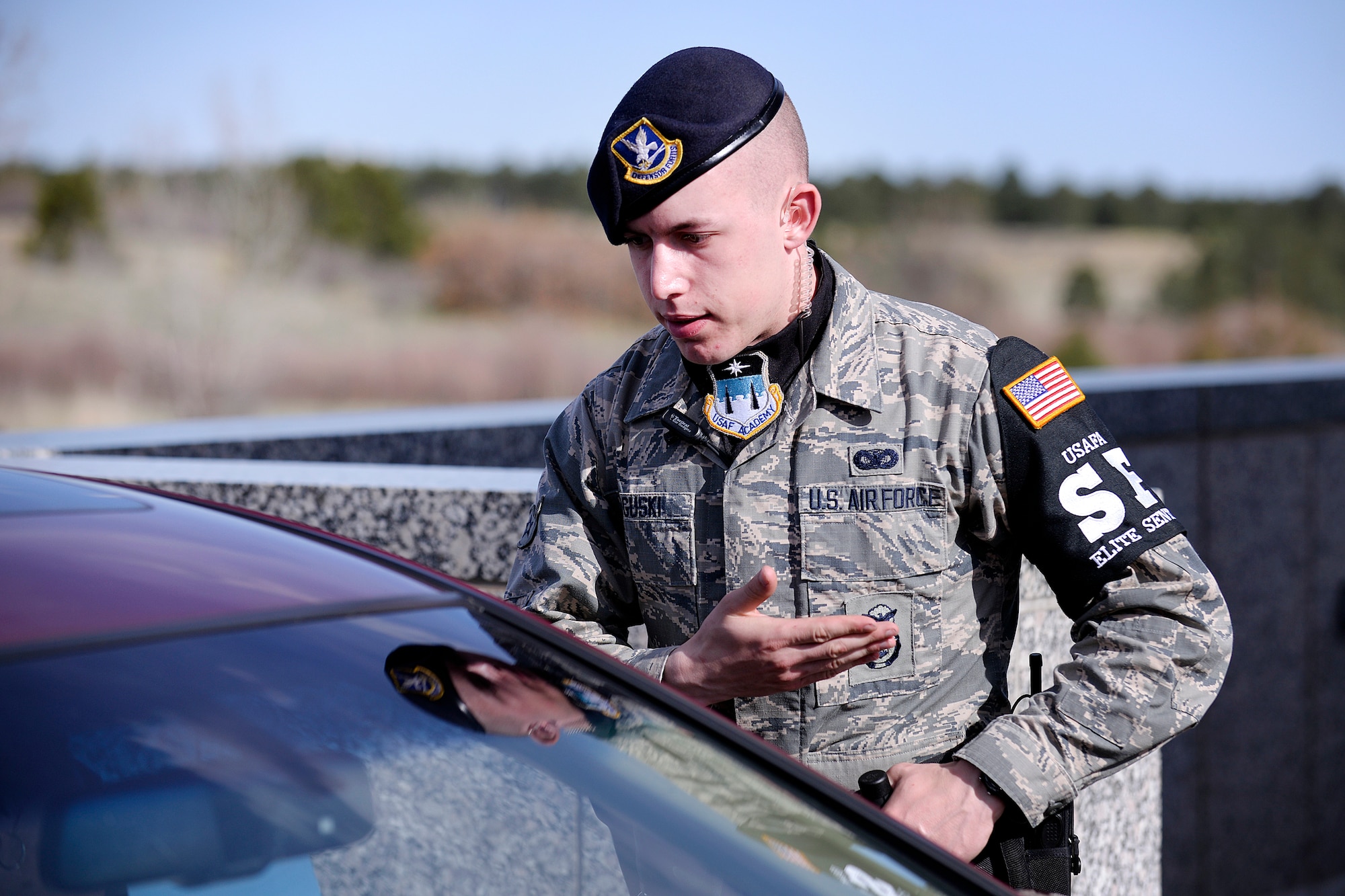 Airman Nicholas Boguski of the 10th Security Forces Squadron monitors vehicle traffic May 5, 2015 at the U.S. Air Force Academy's North Gate. (U.S. Air Force photo/Mike Kaplan)