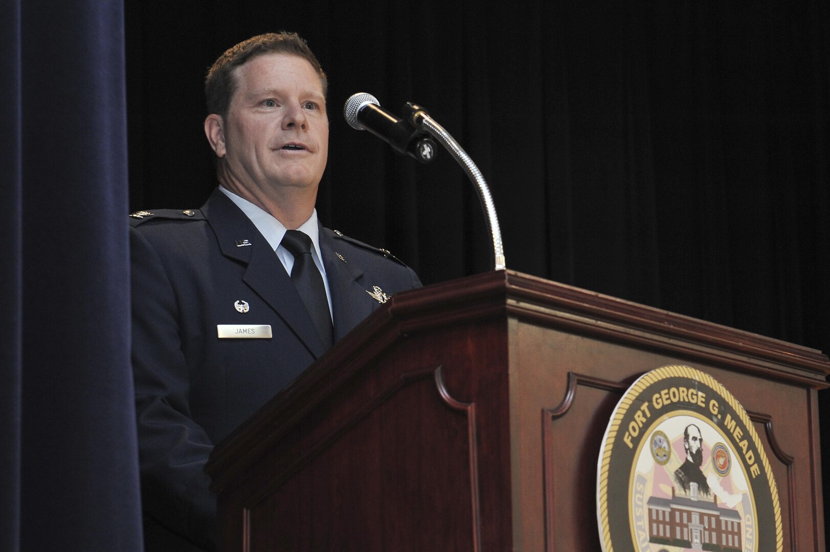 Colonel David James, 691st Intelligence, Surveillance and Reconnaissance Group commander, gives thanks to the attendees and his Airmen during the 691st ISRG re-activation ceremony May 5, 2016, at Fort George G. Meade, Md. Prior to assuming command of the 691st ISRG, James held the position of Director of Cyberspace Policy, Resources and Capabilities for the Under Secretary of Defense for Intelligence, Office of the Secretary of Defense, Washington D.C. position.  (U.S. Air Force photo/Staff Sgt. Alexandre Montes)