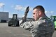 Staff Sgt. Robert Hessler, 87th Aerial Port Squadron, helps guide a vehicle as he works with his fellow Airmen to move pallets during their annual tour here April 19, 2016.  More than 90 Airmen from 445th Logistics Readiness Squadron, 445th Force Support Squadron, 445th Aeromedical Evacuation Squadron and the 87th Aerial Port trained alongside their active duty counterparts on routine operational procedures during their training here.  (U.S. Air Force photo/Tech. Sgt. Frank Oliver)