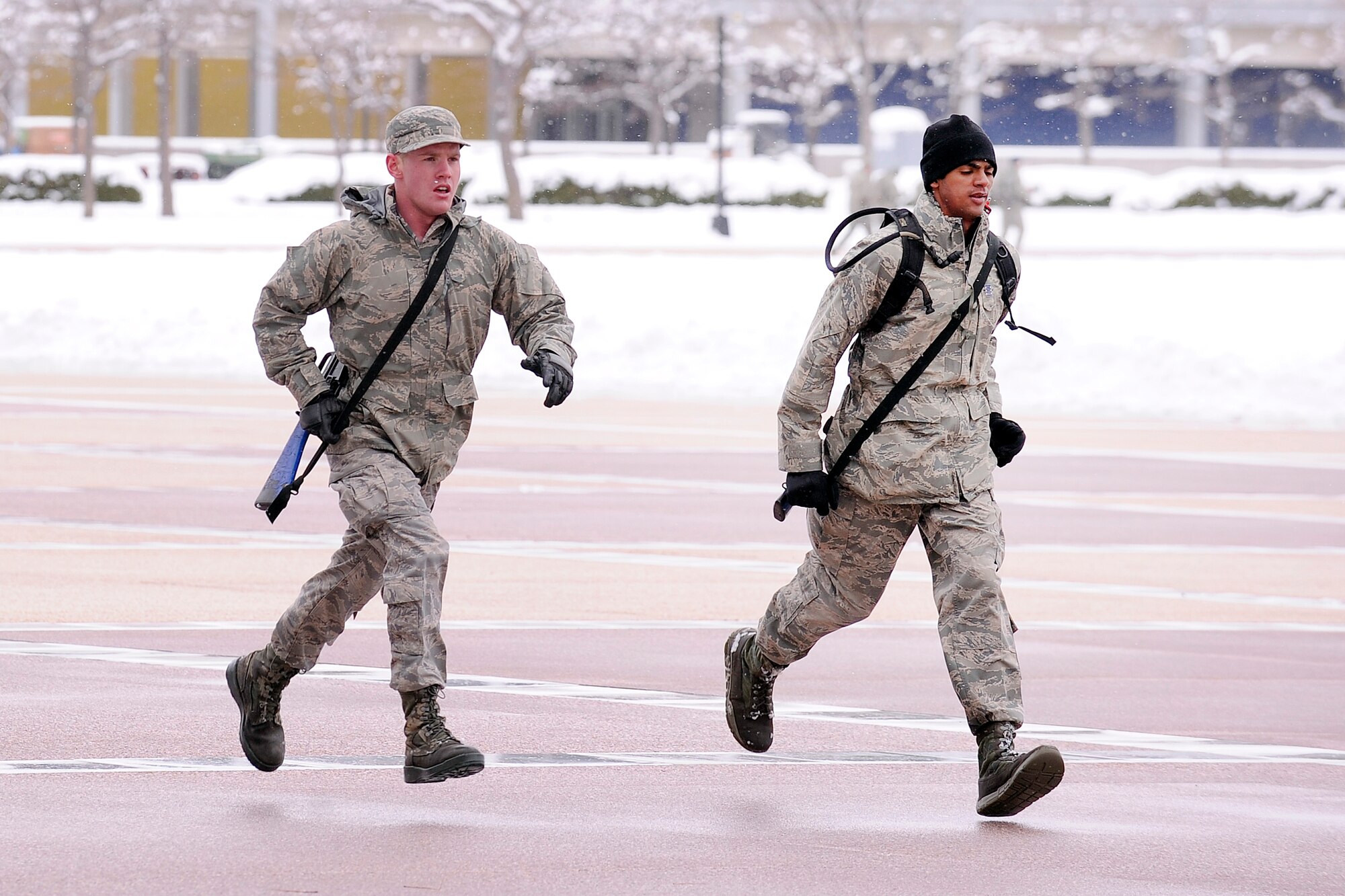 Cadets run across the terrazzo April 30, 2016 during Polaris Warrior at the U.S. Air Force Academy. Polaris Warrior is an annual Cadet Wing Competition focusing on team-building and leadership skills. (U.S. Air Force photo/Mike Kaplan)