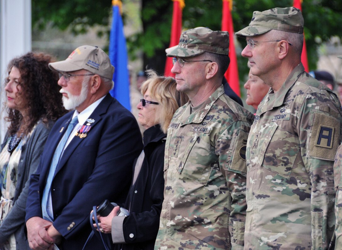 Gen. Robert B. Abrams, commanding general of U.S. Forces Command, second from right, and Lt. Gen. Michael S. Tucker, commanding general of First U.S. Army, right, attend a change-of-command ceremony for the Army Reserve’s 174th Infantry Brigade prior to the FORSCOM Commander’s Dialogue hosted May 4 by the Army Reserve’s 99th Regional Support Command at Joint Base McGuire-Dix-Lakehurst, New Jersey. The purpose of the dialogue was to conduct informal and candid discussions with Army Reserve senior leaders on mission readiness challenges, including best practices. Joining Abrams for the Dialogue were Lt. Gen. Jeffrey W. Talley, chief of Army Reserve and U.S. Army Reserve Command commanding general, and leaders from the Army Reserve’s 99th RSC, 75th Training Command and 1st Mission Support Command.