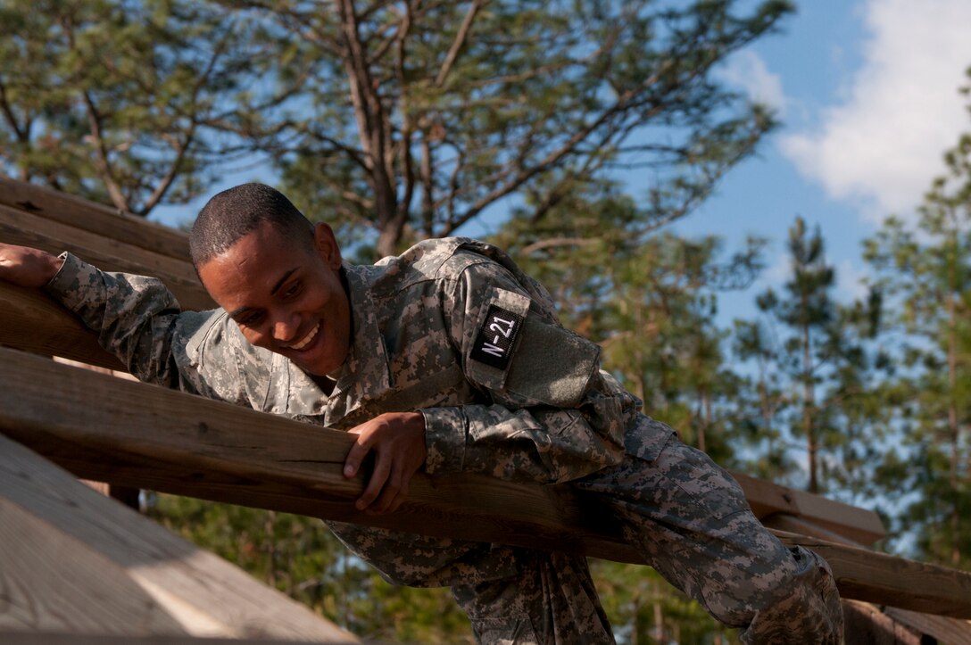 Sgt. Marcus Jackson, a Dental Specialist representing the U.S. Army Reserve Medical Command navigates the Weaver at the Air Assault Obstacle Course at the 2016 U.S. Army Reserve Best Warrior Competition at Fort Bragg, N.C. May 4. This year’s Best Warrior Competition will determine the top noncommissioned officer and junior enlisted Soldier who will represent the U.S. Army Reserve in the Department of the Army Best Warrior Competition later this year at Fort A.P. Hill, Va. (U.S. Army photo by William K. Gillespie / Released)