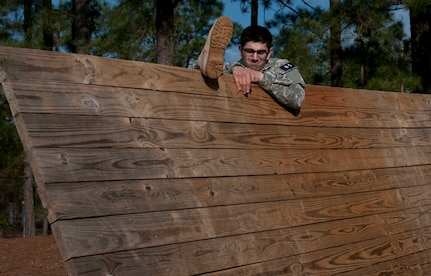 Sgt. Muhammad Ali, a Medical Laboratory Specialist representing the 3rd Medical Command (Deployment Support) tackles the Inclining Wall at the Air Assault Obstacle Course at the 2016 U.S. Army Reserve Best Warrior Competition at Fort Bragg, N.C. May 4. This year’s Best Warrior Competition will determine the top noncommissioned officer and junior enlisted Soldier who will represent the U.S. Army Reserve in the Department of the Army Best Warrior Competition later this year at Fort A.P. Hill, Va. (U.S. Army photo by William K. Gillespie / Released)