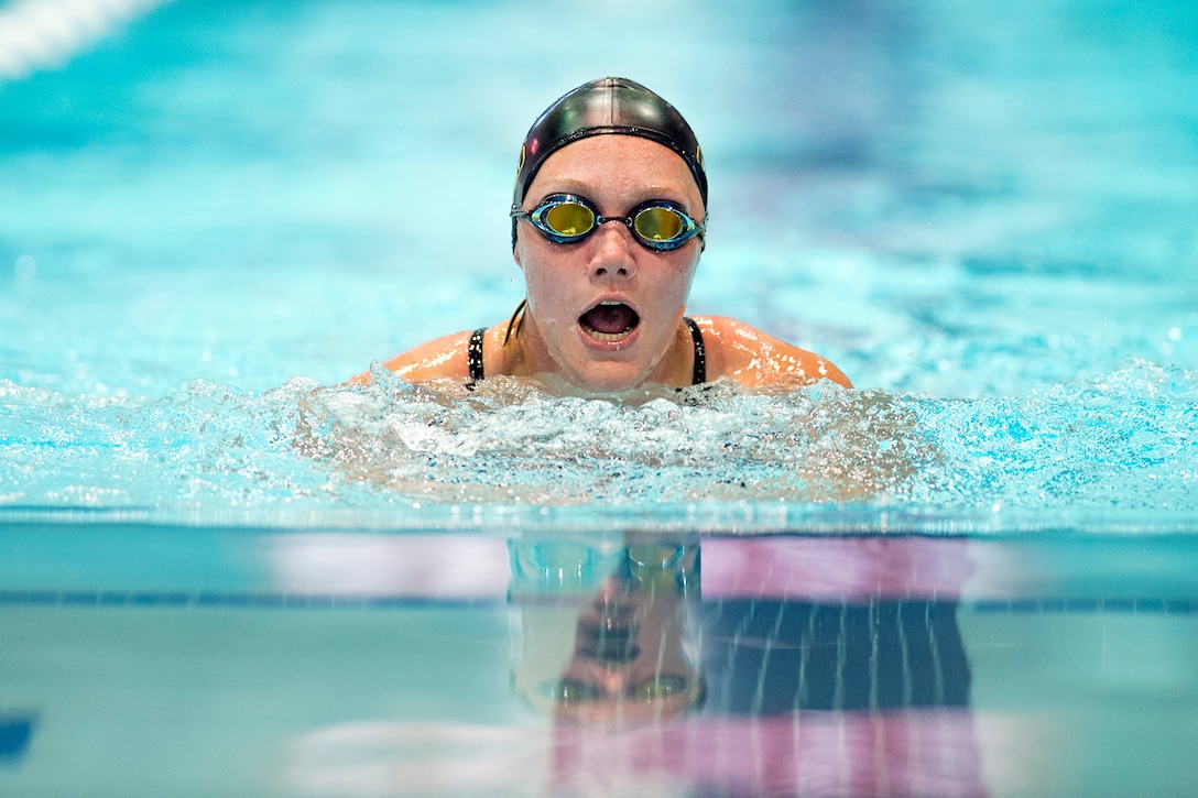 Then-Army Reserve Spc. Chasity Kuczer swims breaststroke during the 2015 Department of Defense Warrior Games in Manassas, Va., June 27, 2015. The swimming event portion of the games was held at the Freedom Aquatic and Fitness Center in Manassas. DoD photo by EJ Hersom