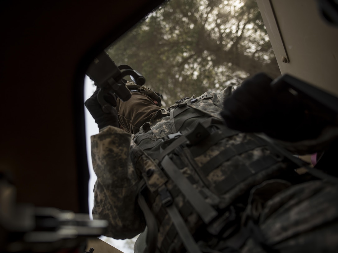Pvt. Anthony Peterson, a U.S. Army Reserve military police Soldier from Apache Junction, Arizona, with the 56th Military Police Company (Combat Support), of Mesa, Arizona, rides in the gunner turret during a cordon and search training lane at Fort Hunter-Liggett, California, May 4. Approximately 80 units from across the U.S. Army Reserve, Army National Guard and active Army are participating in the 84th Training Command's second Warrior Exercise this year, WAREX 91-16-02, hosted by the 91st Training Division at Fort Hunter-Liggett, California. (U.S. Army photo by Master Sgt. Michel Sauret)