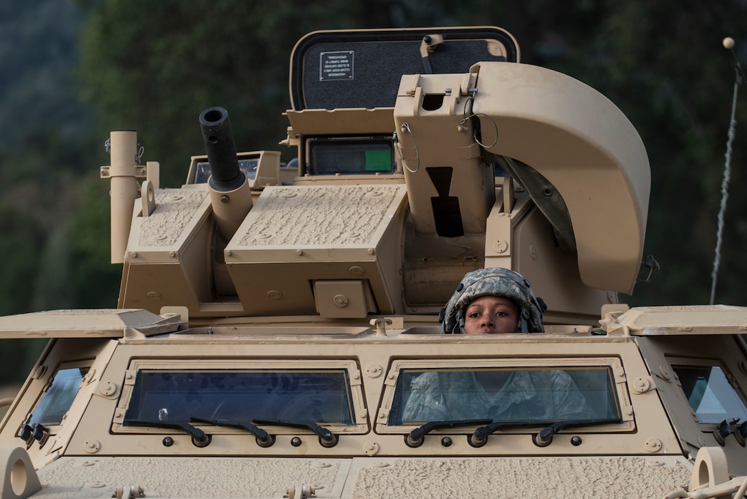 Spc. Adrianna Harris, a U.S. Army Reserve military police Soldier from Los Angeles, with the 56th Military Police Company (Combat Support), of Mesa, Arizona, drives an M1117 Armored Security Vehicle to a staging area in preparation for a cordon and search training lane at Fort Hunter-Liggett, California, May 4. Approximately 80 units from across the U.S. Army Reserve, Army National Guard and active Army are participating in the 84th Training Command's second Warrior Exercise this year, WAREX 91-16-02, hosted by the 91st Training Division at Fort Hunter-Liggett, California. (U.S. Army photo by Master Sgt. Michel Sauret)