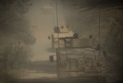 A convoy of gunner vehicles kicks up dust during a cordon and search training lane at Fort Hunter-Liggett, California, conducted by U.S. Army Reserve military police Soldiers from the 56th Military Police Company (Combat Support), of Mesa, Arizona, May 4. Approximately 80 units from across the U.S. Army Reserve, Army National Guard and active Army are participating in the 84th Training Command's second Warrior Exercise this year, WAREX 91-16-02, hosted by the 91st Training Division at Fort Hunter-Liggett, California. (U.S. Army photo by Master Sgt. Michel Sauret)