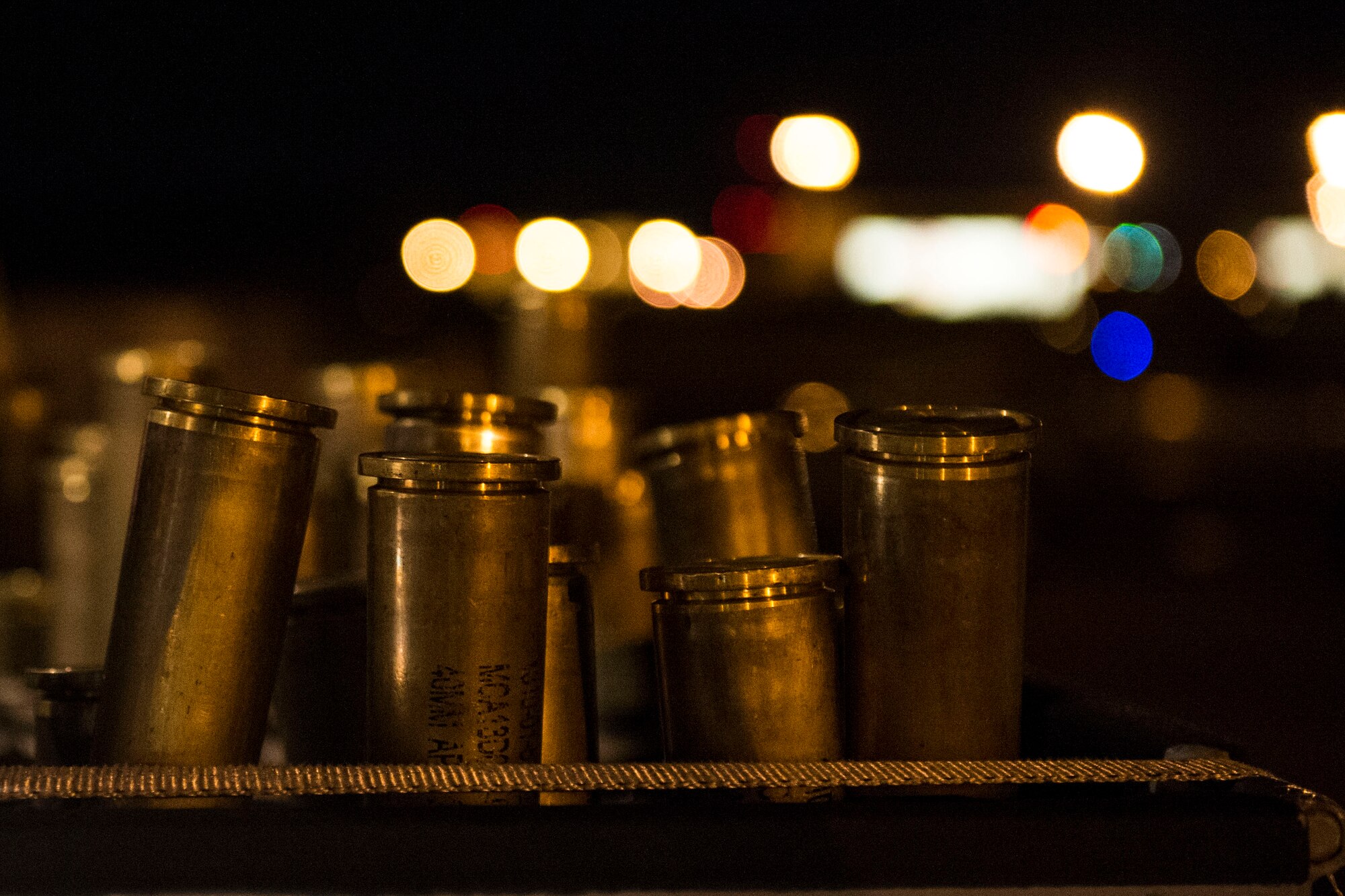 Spent shell casings are off-loaded from an AC-130U Spooky gunship at Hurlburt Field, Fla., May 4, 2016, during Emerald Warrior. (U.S. Air Force photo by Senior Airman Taylor Queen)
