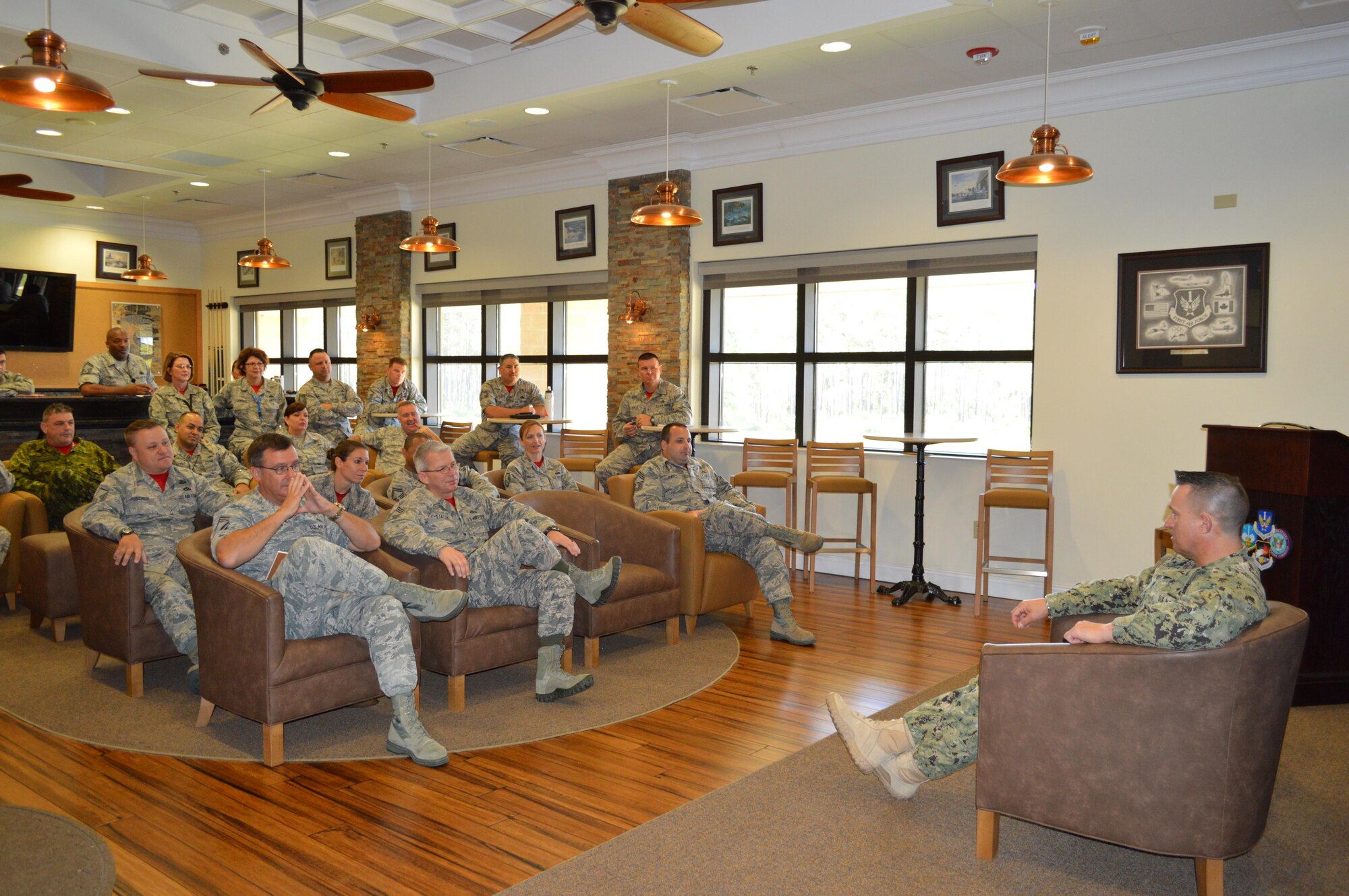 Navy Fleet Master Chief Terrence Molidor, North American Aerospace Defense Command and United State Command Senior Enlisted Leader, listens to a question during his senior enlisted call at the Killey Center May 6. During his visit, Molidor provided audience members with a current command perspective and answered questions from the audience. (Photo by Mary McHale)