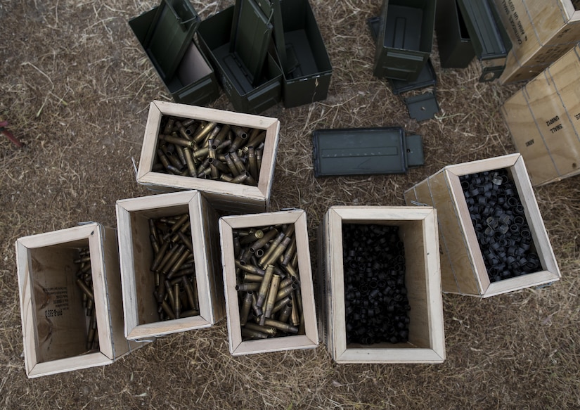 Expended brass shells and discarded clips are collected into various boxes for turn in throughout a mounted crew-served weapon qualification range at Fort Hunter-Liggett, California, conducted by U.S. Army Reserve military police Soldiers from the 341st MP Company, of Mountain View, California, May 4. The 341st MP Co. is one of the first units in the Army Reserve conducting a complete 6-table crew-serve weapon qualification, which includes firing the M2, M249 and M240B machine guns both during the day and night. (U.S. Army photo by Master Sgt. Michel Sauret)