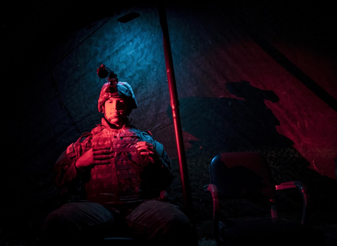 Spc. Bradley Schopf, a U.S. Army Reserve military police Soldier with the 341st MP Company, of Tracy, Califonia, waits for range control to give his unit clearance for a mounted crew-served weapon night fire qualification table at Fort Hunter-Liggett, California, May 3. The 341st MP Co. is one of the first units in the Army Reserve conducting a complete 6-table crew-serve weapon qualification, which includes firing the M2, M249 and M240B machine guns both during the day and night. (U.S. Army photo by Master Sgt. Michel Sauret)