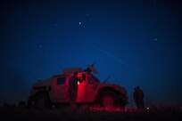 U.S. Army Reserve military police Soldiers from the 341st MP Company, of Mountain View, California, prepare their vehicles for on a mounted crew-served weapon night fire qualification table at Fort Hunter-Liggett, California, May 3. The 341st MP Co. is one of the first units in the Army Reserve conducting a complete 6-table crew-serve weapon qualification, which includes firing the M2, M249 and M240B machine guns both during the day and night. (U.S. Army photo by Master Sgt. Michel Sauret)