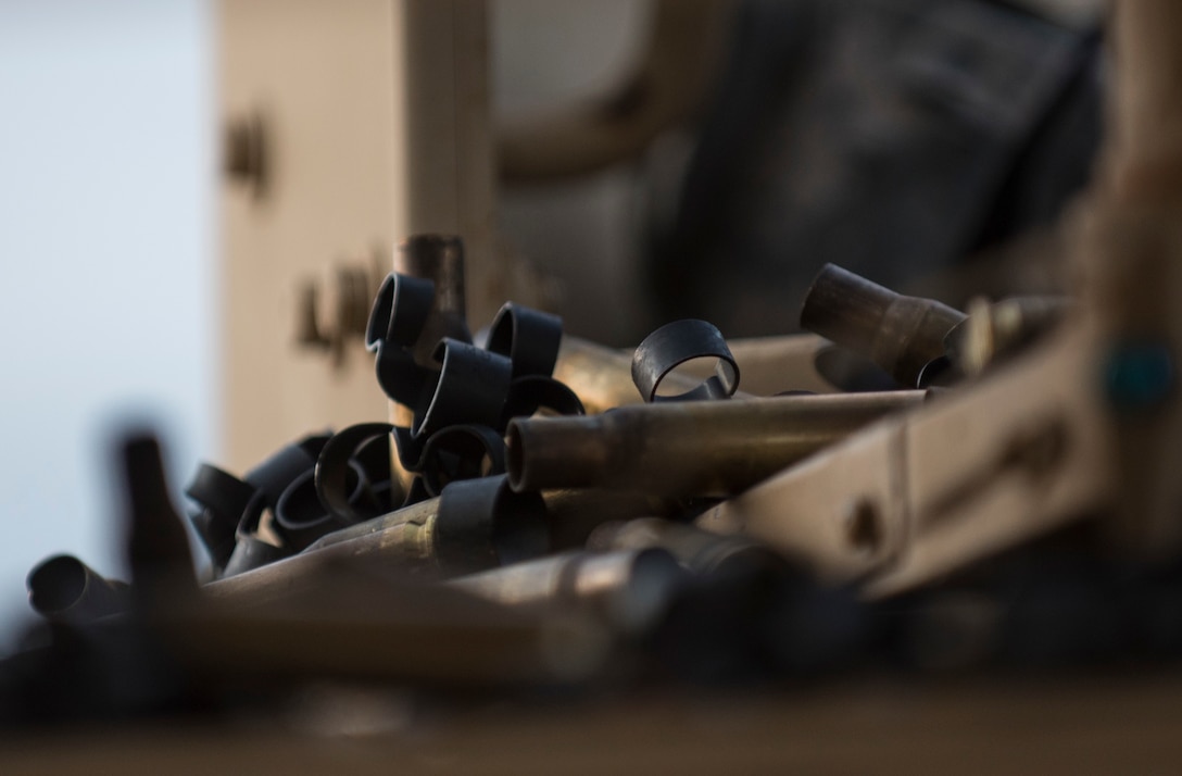 Shell casings from a .50-caliber machine gun pile up by a vehicle turret after a table of fire with the M2 Bradley Machine Gun as part of a crew-served weapon training conducted by the 341st Military Police Company, of Mountain View, California, at Fort Hunter-Liggett, California, May 3. The 341st MP Co. is one of the first units in the Army Reserve conducting a complete 6-table crew-serve weapon qualification, which includes firing the M2, M249 and M240B machine guns both during the day and night. (U.S. Army photo by Master Sgt. Michel Sauret)