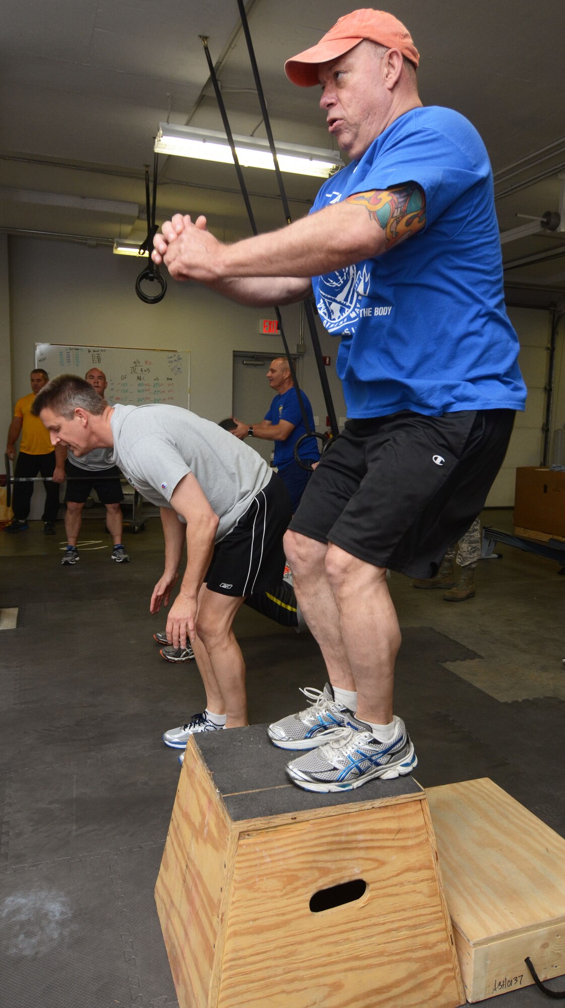 Senior Master Sgt. Scott Pelley performs a box jump as part of a fitness challenge designed to bring awareness to veteran suicides and promote suicide prevention at Dobbins Air Reserve Base, Ga., April 22, 2016.(U.S. Air Force photo/Don Peek)