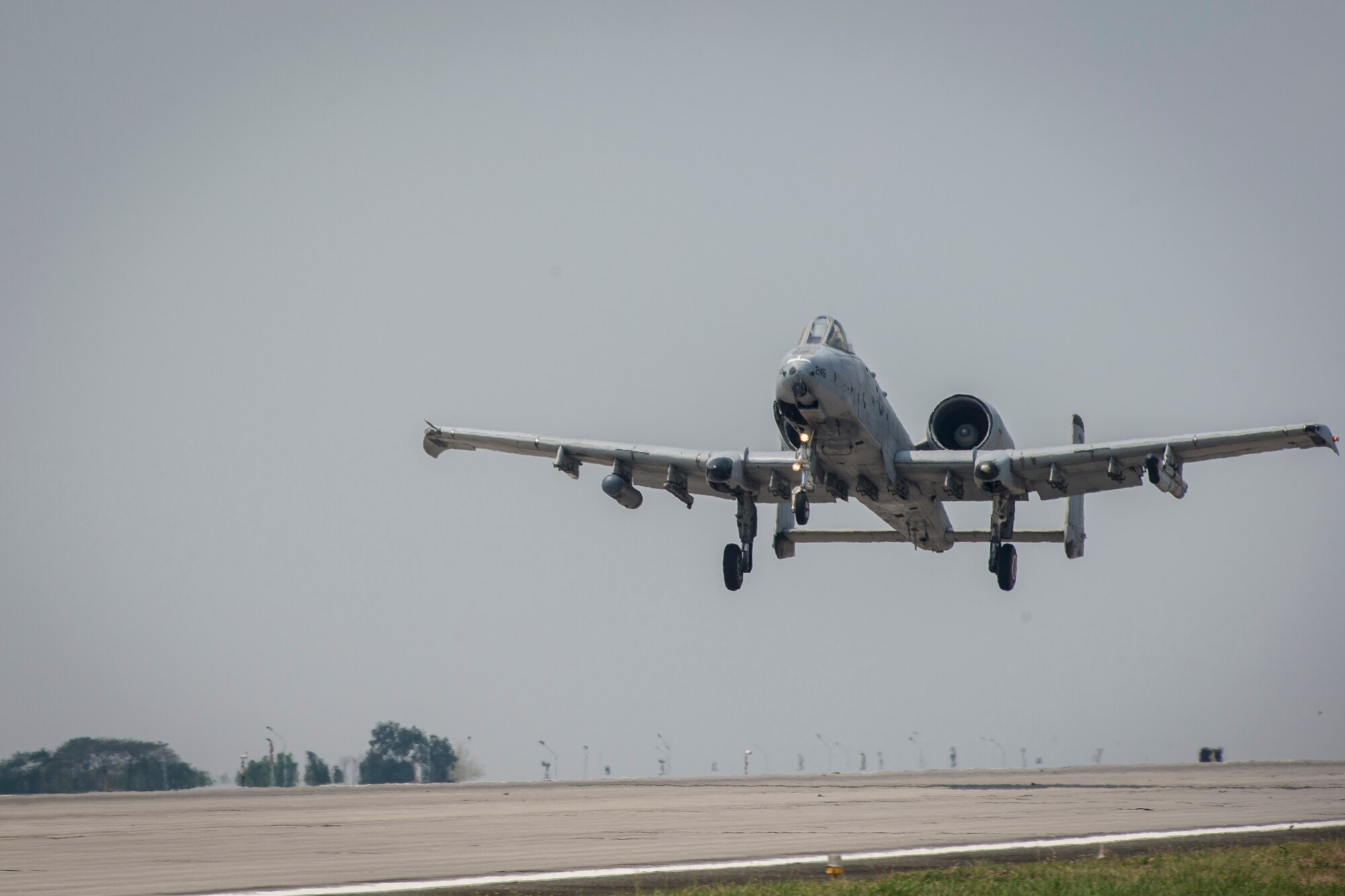 A U.S. Air Force A-10C Thunderbolt II, with the 51st Fighter Wing, Osan Air Base, Republic of Korea, takes off from Clark Air Base, Philippines, April 28, 2016. The A-10Cs flew their last U.S. Pacific Command Air Contingent mission as this iteration comes to a close in the Indo-Asia-Pacific region. The Air Contingent, which was stood up at the invitation of the Philippine government, promotes interoperability and provides greater and more transparent air and maritime situational awareness to ensure safety for military and civilian activities in international waters and airspace. (U.S. Air Force photo by Staff Sgt. Benjamin W. Stratton)
