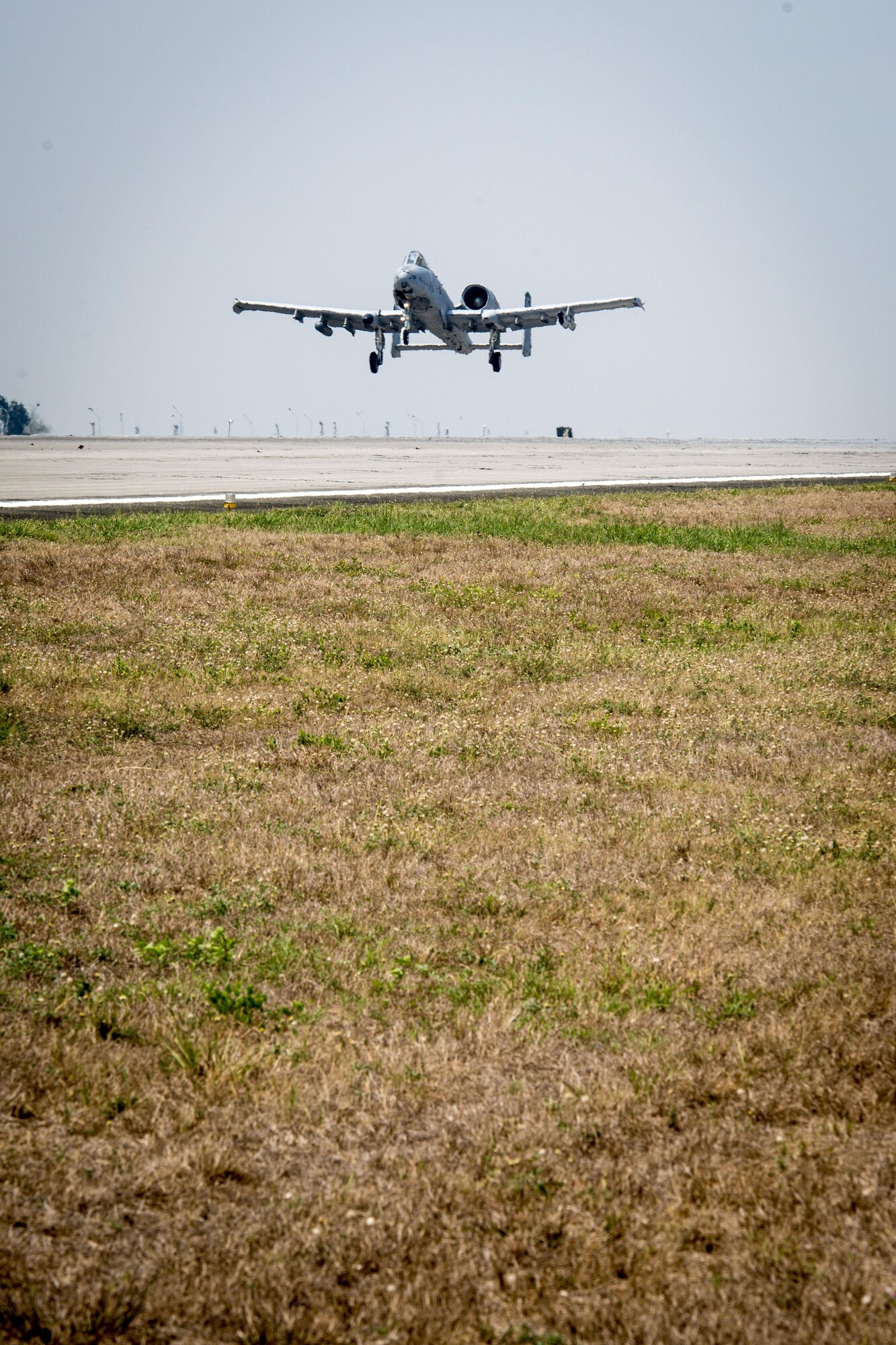A U.S. Air Force A-10C Thunderbolt II, with the 51st Fighter Wing, Osan Air Base, Republic of Korea, takes off from Clark Air Base, Philippines, April 28, 2016. The A-10Cs flew their last U.S. Pacific Command Air Contingent mission as this iteration comes to a close. The A-10C has a proven record operating out of short and varying airstrips, provides a flexible range of capabilities, and has a mission profile consistent with the air and maritime domain awareness operations the U.S. Pacific Command’s Air Contingent is conducting out of the air base. (U.S. Air Force photo by Staff Sgt. Benjamin W. Stratton)