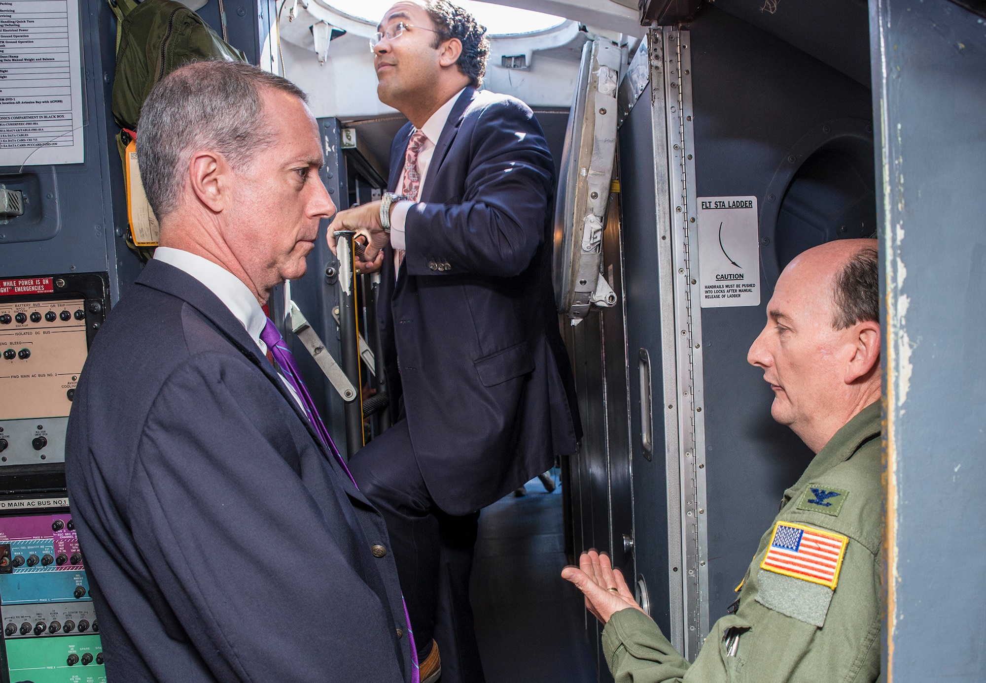 U.S. Rep.William Hurd, 23rd District of Texas, U.S. Rep. Mac Thornberry, 13th District of Texas, and Col. Thomas Smith, 433rd Airlift Wing commander, tour the flight deck of a C-5M Super Galaxy aircraft May 3, 2016 at Joint Base San Antonio-Lackland, Texas. (U.S. Air Force photo by Benjamin Faske) (released)
