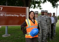 Carmen Aguirre, 47th Contracting Flight contracting officer, and her team pose for a photo in observance of Public Service Recognition Week. Aguirre has worked in public service for nine years, the last three being as a contracting officer. She is currently in charge of a contract dealing with flightline improvements to help keep Laughlin’s mission growing. “Public service to me is being able to serve the community – not just military or civilian – but everyone,” said Aguirre (U.S. Air Force photo/Senior Airman Jimmie D. Pike)