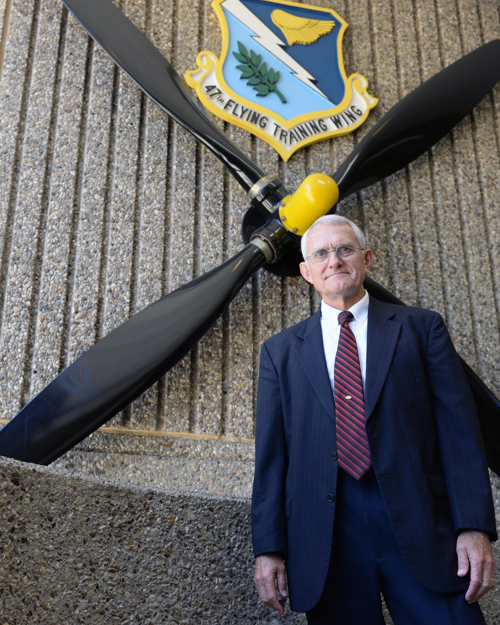 Danny Williams, 47th Student Squadron director of sims and academics, poses for a photo in observance of Public Service Recognition Week. Williams has served as a T-6A Texan II simulator instructor at Laughlin Air Force Base since 1987. His daily actions help graduate the world’s greatest pilots for the Air Force. “Public service to me is serving others and helping to build a better military to help the needs of people in other countries,” said Williams. (U.S. Air Force photo/Senior Airman Jimmie D. Pike)