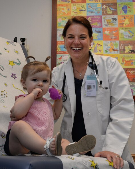 Tephanie Soderstrom, 47th Medical Operation Squadron family practice physician assistant, and patient Ryder Sparks pose for a photo in observance of Public Service Recognition Week. Soderstrom’s work makes it possible to accomplish the mission by providing health care to families to help maintain a healthy lifestyle and deployment readiness. “Public service to me is simply service before self,” said Soderstrom. (U.S. Air Force illustration/Senior Airman Jimmie D. Pike)