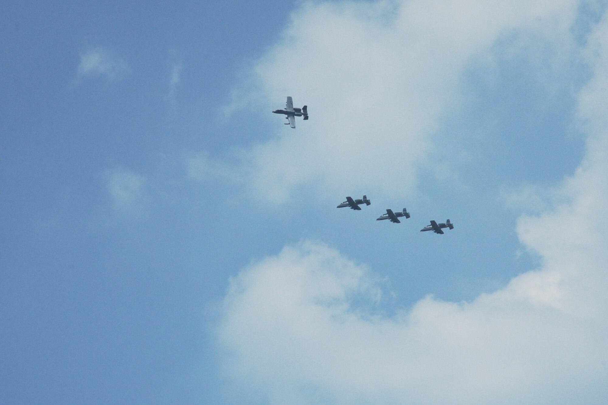 Four U.S. Air Force A-10C Thunderbolt II 
aircraft fly over Clark Air Base, Philippines, upon return from a maritime domain awareness mission April 28, 2016. The aircraft were based out of Clark Air Base, Philippines for the past two weeks as part of U.S. Pacific Command’s first Air Contingent. The air and maritime domain awareness missions promote interoperability and provide greater and more transparent air and maritime situational awareness ensuring safety for military and civilian activities in international waters and airspace. The Air Contingent was stood up at the invitation of the Philippine government and afforded both countries an opportunity to strengthen ties. (U.S. Air Force photo by Capt. Susan Harrington)
