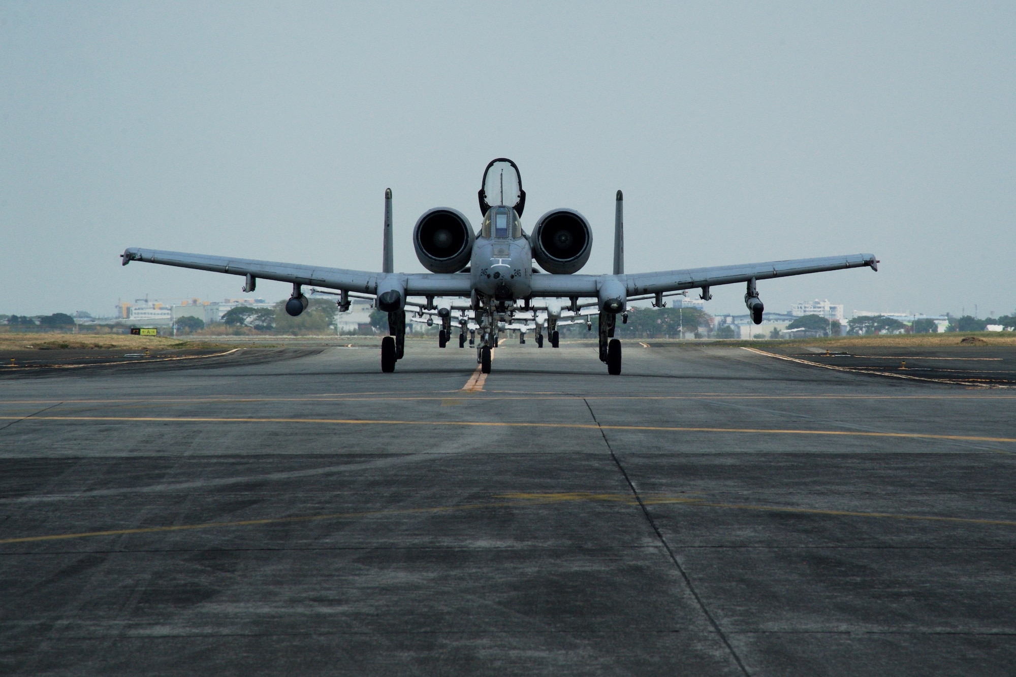 Four U.S. Air Force A-10C Thunderbolt II aircraft taxi down the runway at Clark Air Base, Philippines, after completing an air and maritime domain awareness mission in international waters west of the Philippines April 28, 2016. These aircraft are part of U.S. Pacific Command’s Air Contingent, which was stood up at the invitation of the Philippine government in order to strengthen cooperation and interoperability between the U.S. and Philippines. The Air Contingent  provides greater and more transparent air and maritime situational awareness to ensure safety for military and civilian activities in international waters and airspace. The AMDA missions the A-10C’s conducted during the deployment enhance the ongoing maritime situational awareness missions that have been carried out by the U.S. Navy’s P-8 deployments to Clark for a number of years. (U.S. Air Force photo by Capt. Susan Harrington)