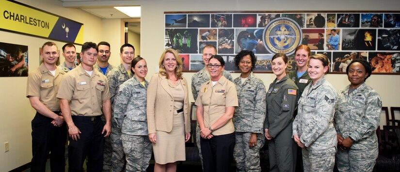 Secretary of the Air Force Deborah Lee James, middle, stands with Joint Base Charleston exceptional performers May 6, 2016, at JB Charleston, S.C. James had the opportunity to listen to each of their stories and accomplishments as well as answering any questions they had for her. (U.S. Air Force Photo/Senior Airman Clayton Cupit)