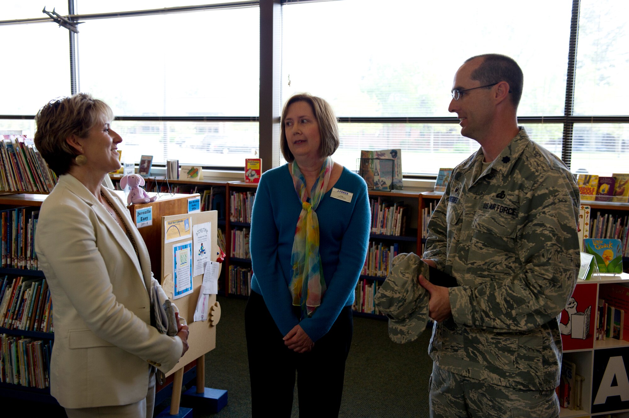 Tammy Cox (left), spouse of 18th Air Force commander Lt. Gen. Sam Cox, speaks with Lisa Love (center), 92nd Force Support Squadron library director, and Lt. Col. Daniel Rigsbee (right), 92nd FSS commander, about the importance of education for military families during a base tour May 5, 2016, at Fairchild Air Force Base, Wash. Fairchild has an education center complete with a library and education program that has four on-base colleges. (U.S. Air Force photo/Airman 1st Class Nick J. Daniello)