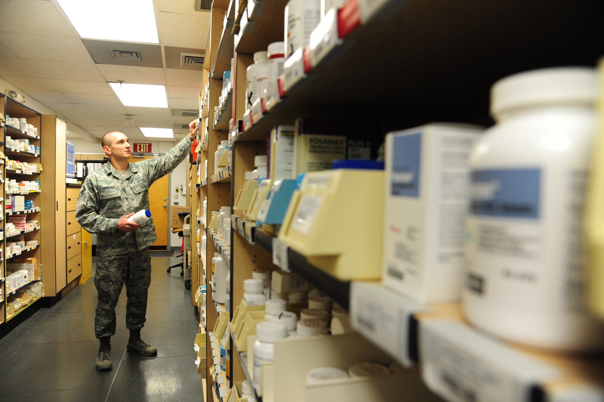 U.S. Air Force Senior Airman Marco Cardenas, a 509th Medical Support Squadron pharmacy technician, verifies medication inventory levels at Whiteman Air Force Base, Mo., April 20, 2016. The pharmacy stocks over 1,300 medications each month to ensure adequate supply. (U.S. Air Force photo by Airman 1st Class Keenan Berry)