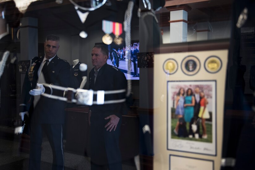 U.S. Air Force Vice Chief of Staff Gen. David L. Goldfein speaks with Lt. Col. Peter A. Tritsch Jr., U.S. Air Force Honor Guard commander, during an 11th Operations Group immersion tour at Joint Base Anacostia-Bolling, Washington, D.C., May 3, 2016. Goldfein toured the 11th OG to meet Airmen and learn about the mission. (U.S. Air Force photo by Airman 1st Class Philip Bryant)