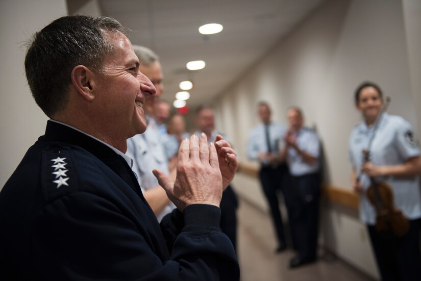 U.S. Air Force Vice Chief of Staff Gen. David L. Goldfein applauds after a Celtic Aire performance during an 11th Operations Group immersion tour at Joint Base Anacostia-Bolling, Washington, D.C., May 3, 2016. Goldfein toured the 11th OG to meet Airmen and learn about the mission. Celtic Aire is a subset of the Singing Sergeant, the official chorus of the U.S. Air Force. (U.S. Air Force photo by Airman 1st Class Philip Bryant)