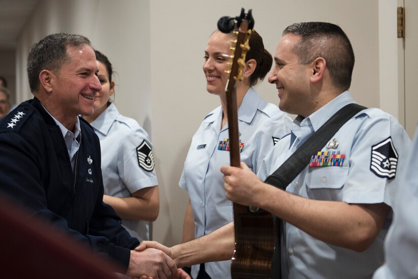 U.S. Air Force Vice Chief of Staff Gen. David L. Goldfein shakes hands with a U.S. Air Force Band member during an 11th Operations Group immersion tour at Joint Base Anacostia-Bolling, Washington, D.C., May 3, 2016. Goldfein toured the 11th OG to meet Airmen and learn about the mission. (U.S. Air Force photo by Airman 1st Class Philip Bryant)