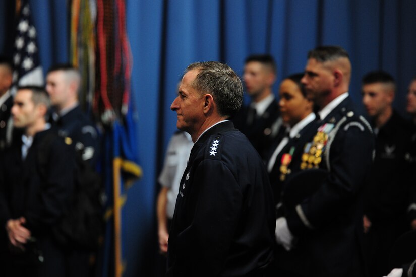 U.S. Air Force Vice Chief of Staff Gen. David L. Goldfein watches the U.S. Air Force Honor Guard Drill Team during an 11th Operations Group immersion tour at Joint Base Anacostia-Bolling, Washington, D.C., May 3, 2016. Goldfein toured the 11th OG to meet Airmen and learn about the mission. (U.S. Air Force photo by Staff Sgt. Kurtis Brown)