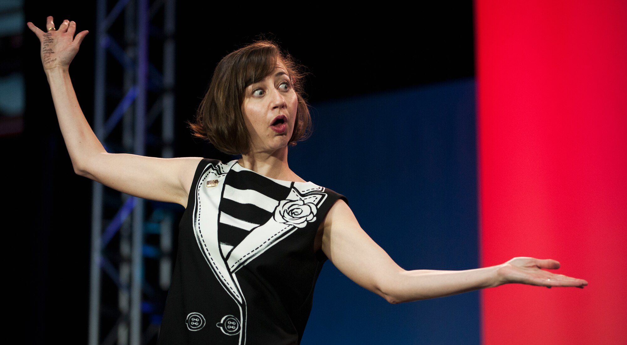 Kristen Schaal, comedian, performs a comedy skit during the ‘Celebration of Service’ comedy show on Joint Base Andrews, Md., May 5, 2016. The show celebrated Military Appreciation Month, the 5th Anniversary of Joining Forces and the 75th Anniversary of the USO. Nearly 1,500 service members, veterans and their families were on hand to see performances by Judd Apatow, Mike Birbiglia, Kristen Schaal, Hasan Minhaj, John Mulaney and Jeff Ross. (U.S. Air Force photo by Airman 1st Class Philip Bryant)